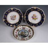 A Continental Saucer Dish painted classical landscape within floral border and blue and gilt