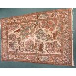 A Kashan Hunting Rug, the central rectangular ivory field with exotic animals and foliage, inner