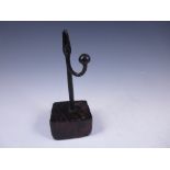 A small Rushlight Holder on square wooden block base, 8 1/2 in