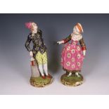 A pair of 19th Century hand painted Derby Figures in brightly coloured 18th Century costume on