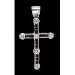 A Diamond Pendant Cross channel-set six brilliant-cut stones interspersed with trios of black