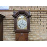 An 18th Century Longcase Clock with arched silvered and brass dial having date aperture and