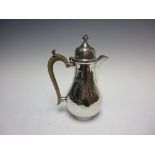 A George V silver baluster Hot Water Jug, Birmingham 1926