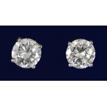 A pair of Diamond Ear Studs each claw-set brilliant-cut stone, total diamond weight 2.35cts, in