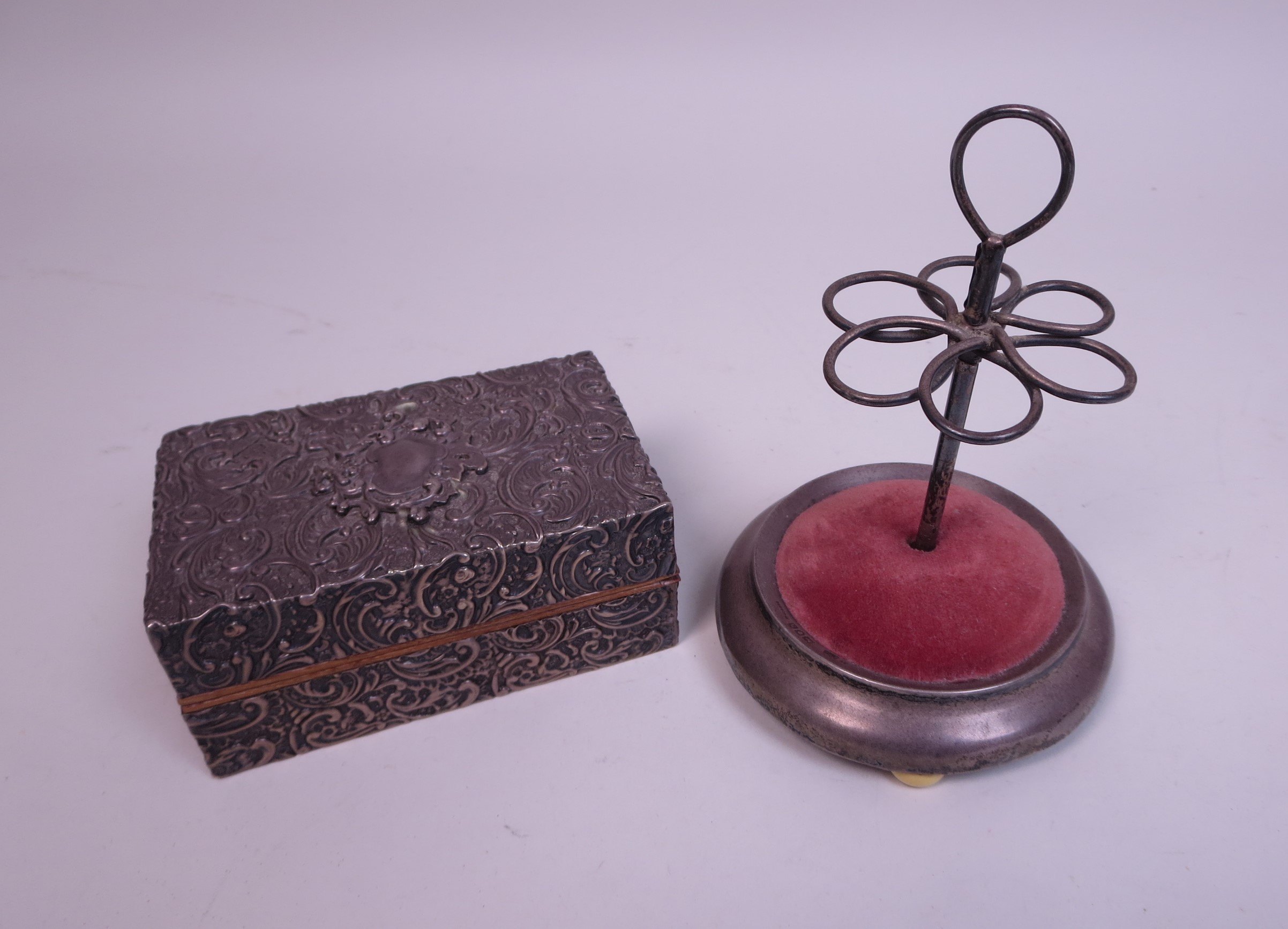 A Victorian silver mounted Box embossed scrolls and vacant cartouche, Chester 1898 and a Hatpin