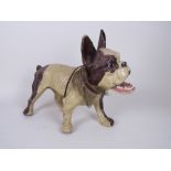 A French Bulldog of papier mache construction with nodding and growling chain operated action in the