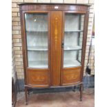 An Edwardian mahogany China Display Cabinet with satinwood scroll inlay, fitted glazed door on
