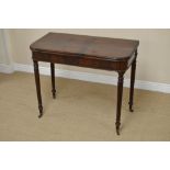 A William IV mahogany Tea Table, raised on fluted tapered supports and brass casters, 3ft W