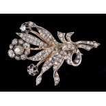 A Victorian Diamond Flower Spray Brooch set throughout old and rose-cut stones in silver backed with