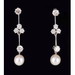 A pair of Diamond and Cultured Pearl Ear Pendants each claw-set brilliant-cut stone suspending knife