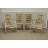 A Suite of Louis XVI style Salon Chairs, parcel gilt and cream, with floral needlepoint-