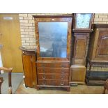 An 18th Century walnut Cabinet on Chest, the moulded cornice above a single mirrored door