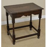 A 17th Century oak Side Table with moulded top above shaped frieze on gun barrel turned and square