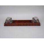 An Aspreys Inkwell and Pen Tray Desk Set on crocodile skin base with silver fittings, 1ft 3in W