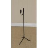 A large wrought iron Rushlight Holder on tripod base, 2ft 8in