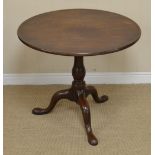 A George III mahogany Pillar Table with single piece top on bird cage support, baluster turned