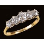 A Diamond five-stone Ring claw-set graduated old-cut stones, ring size R