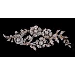 A Victorian Diamond Flower Spray Brooch set throughout old and rose-cut stones in silver backed with