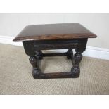 A 17th Century small oak Joint Stool with moulded rectangular top on short baluster turned and