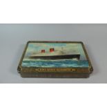 A Decorated Tin, the Lid Inscribed Cunard Line, RMS Queen Elizabeth, Containing Wooden Jigsaw Puzzle