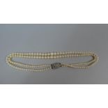A Two String Pearl Necklace with Diamante Clasp