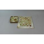 A Green Onyx Chess Board and Chess Men, 21cm Square