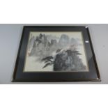 A Framed Oriental Print Depicting House in Mountains