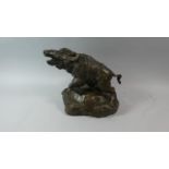 A 19th Century Continental Bronze Study of a Boar with Engraved Shield Mount Set on Naturalistic