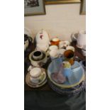 A Tray of Ceramics to Include Commemorative Mugs, Pig Money Box and Winnie the Pooh Chamber Pot,