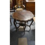 An Edwardian Mahogany Shaped Circular Occasional Table With Stretcher Shelf, 75cm Diameter