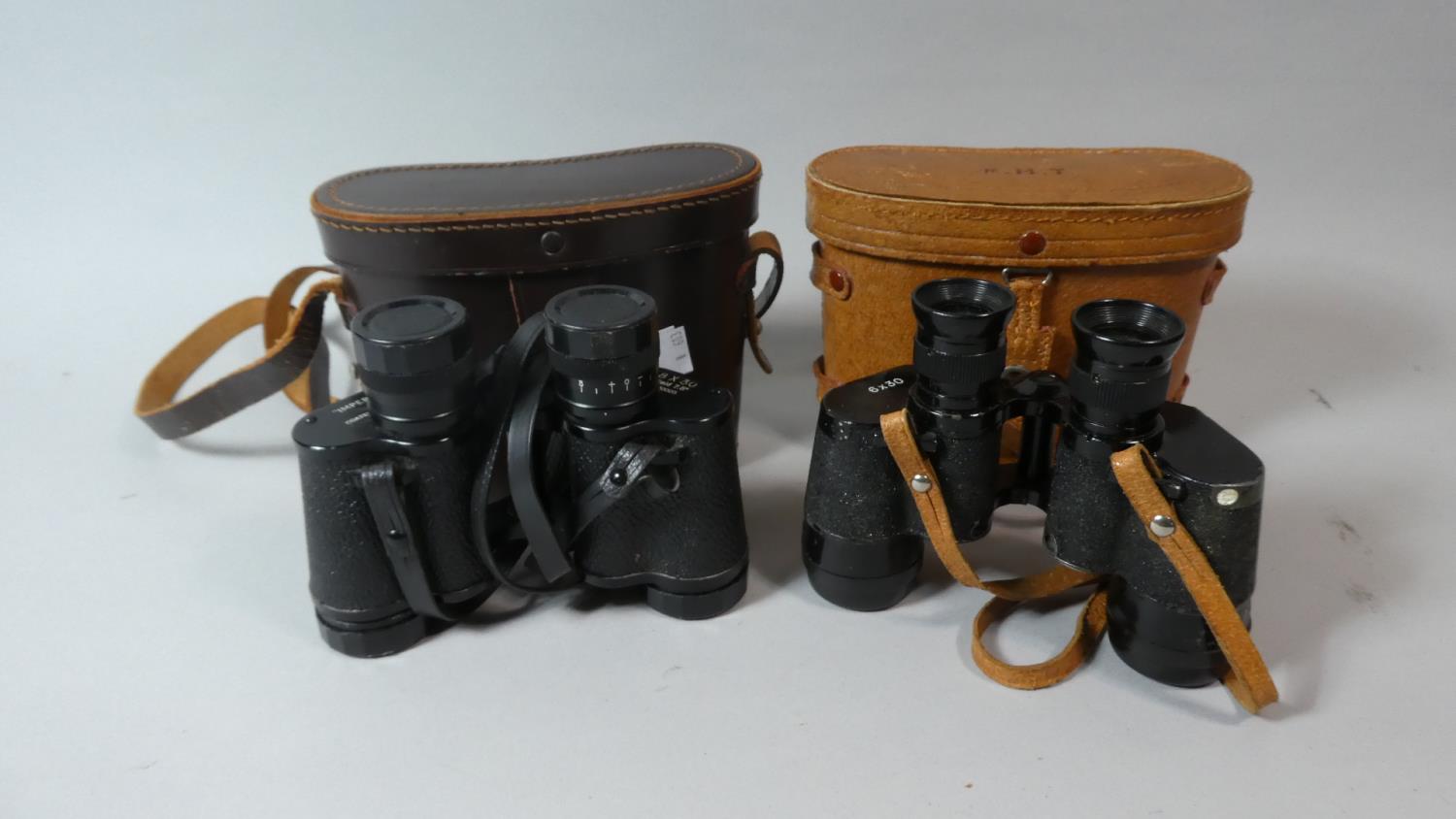 Two Pairs of Cased Binoculars