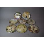 A Collection of Eight Royal Worcester Decorated Plates, Puppy and Kitten