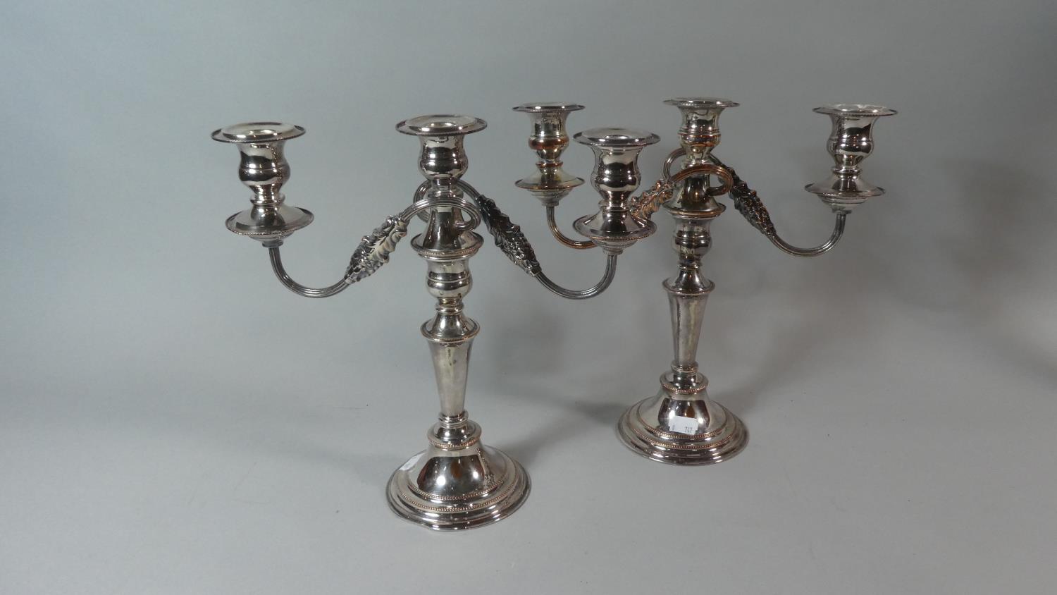 A Pair of Sheffield Plate Three Branch Candelabra, Each 29cm High