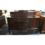 An Edwardian Mahognay Bow Fronted Sideboard with Raised Galleried Back, Three Centre Drawers Flanked