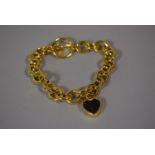 A Yellow Metal Charm Bracelet By Kelly Hoppen