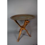A North African Cairo Ware Mixed Metal Tray on Carved Wooden Tripod with Elephant Decoration, 49.5cm
