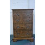 A Burr Walnut Shelved Cabinet In the form of a Four Drawer Chest with Brushing Slide Over, 58cm Wide