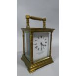 A Brass Carriage Clock with White Enamelled Dial Inscribed Goldsmiths & Silversmiths Co. Regent