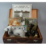 A Vintage Cased Containing Canadian Number Plate, Spaniel Ornament, Books, Poster Etc