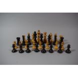 A Full Set of Small Turned Wooden 'Staunton Style' Chess Pieces, King 7cm High