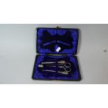 A Cased Silver Mounted Sewing Kit to Include Hook Tweezers and Thimble