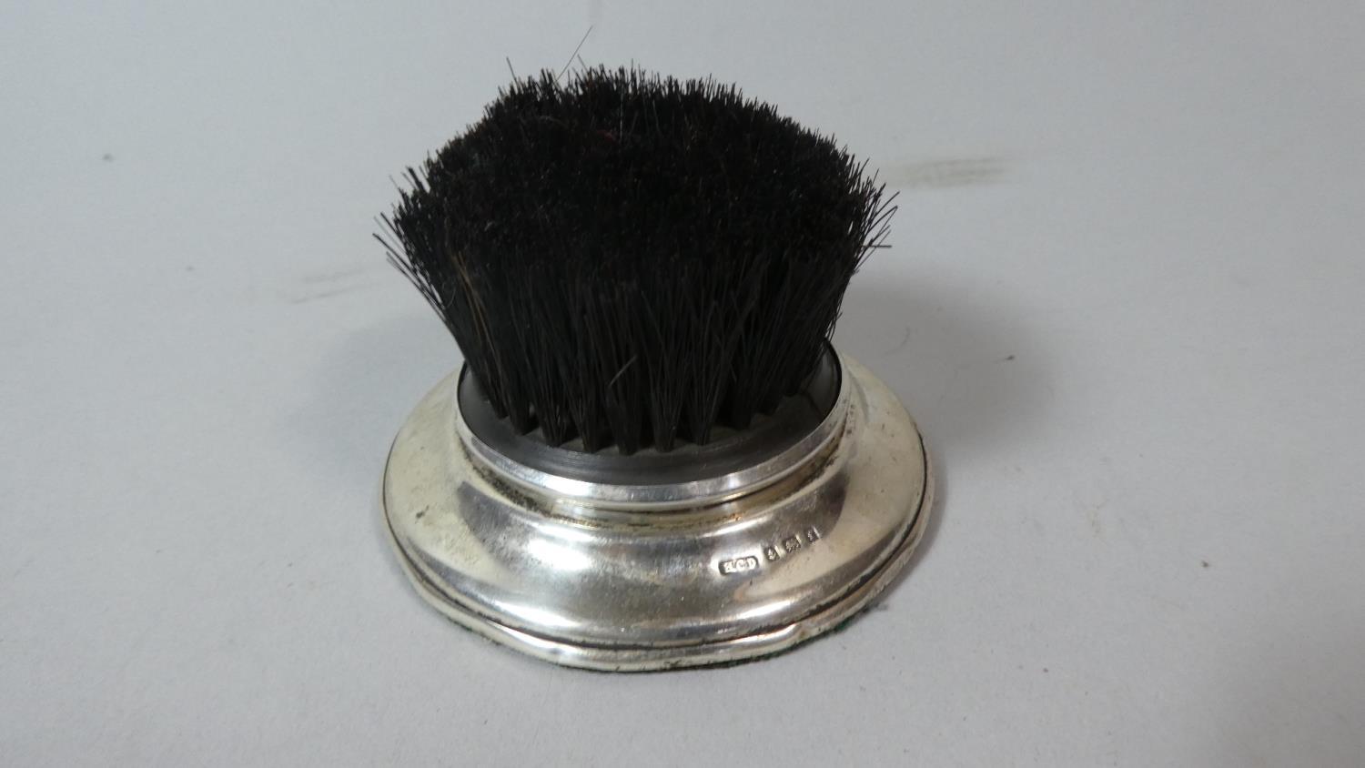 A Silver Mounted Desk Top Pen Brush, Birmingham 1903, 6cm High