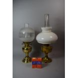 Two Brass Oil Lamps with Glass Shades and Chimneys