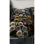 A Box of Studio Pottery, Glazed Mugs etc