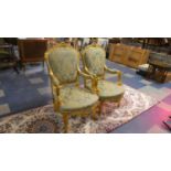 A Pair of French Style Gilt Framed Ornate Salon Arm Chairs