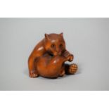 A Japanese Carved Wooden Netsuke of a Bear, Signed, 4.5cm High
