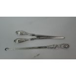 A Pair of Silver Handled Glove Stretchers and a Silver Handled Button Hook