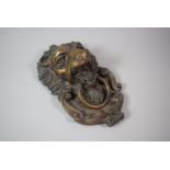 A Large Heavy Cast Bronze Door Knocker in the Form of a Lion Mask, 29cm High