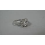 A Silver and CZ Dress Ring