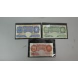 Three Vintage British Bank Notes to Include Ten Shillings Note and Two One Pound Note